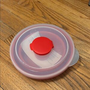 Pampered Chefs silicone, microwavable c popcorn popper.